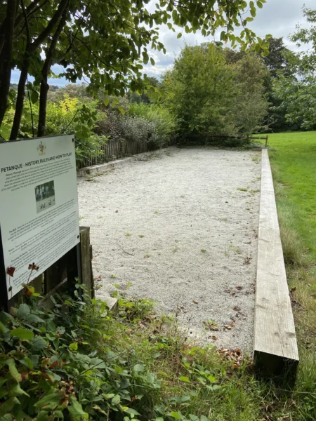 The Petanque Piste in Chacewater Millennium Green with trees in the background.